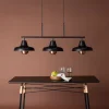 Fjôrd Hanglamp Stöten Mat Zwart Metaal/Koper Finish